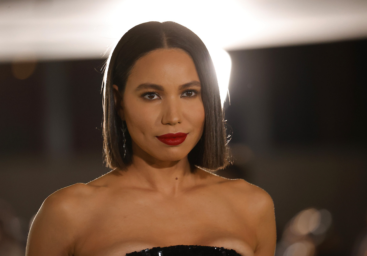 Jurnee Smollett attends the 2021 Academy Museum of Motion Pictures Opening Gala in a black dress and red lipstick