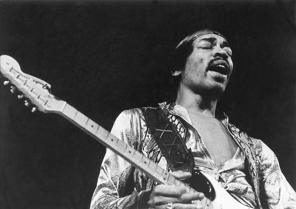 Jimi Hendrix playing guitar