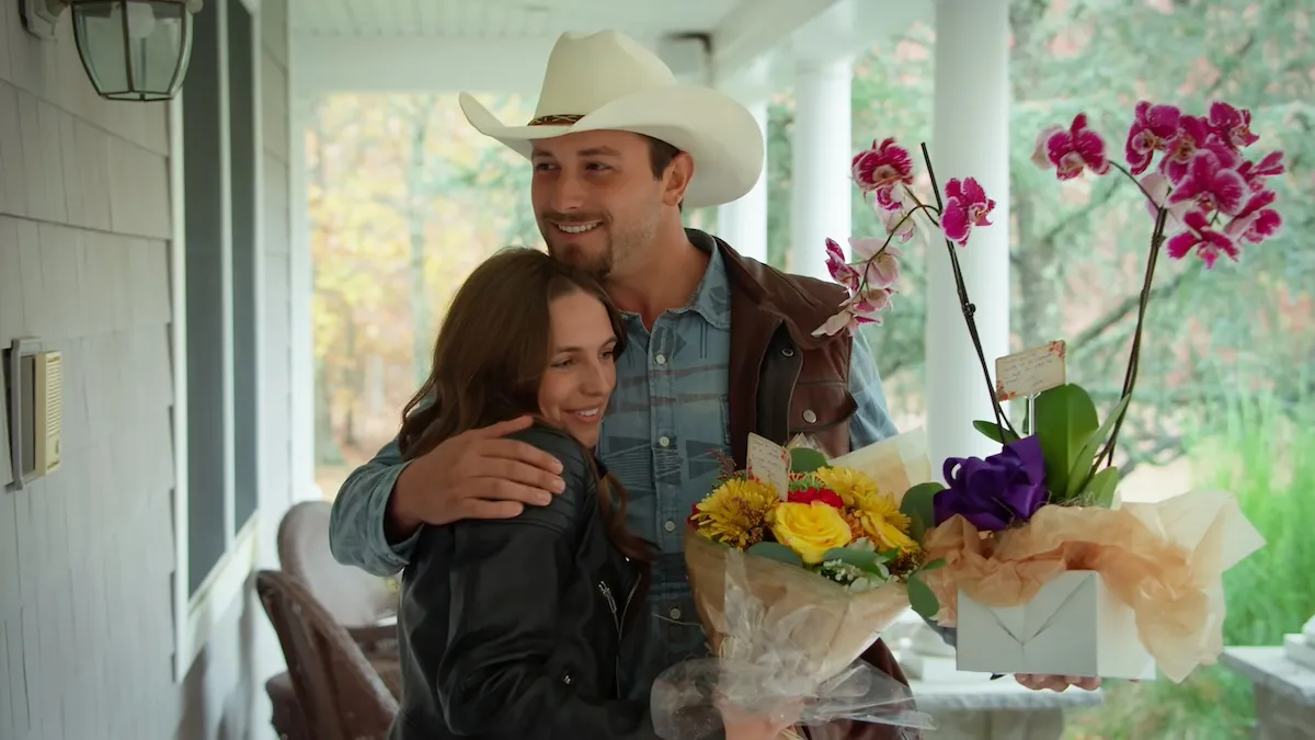 Mitchell hugs Sydney while holding flowers in 'Farmer Wants a Wife' Season 2