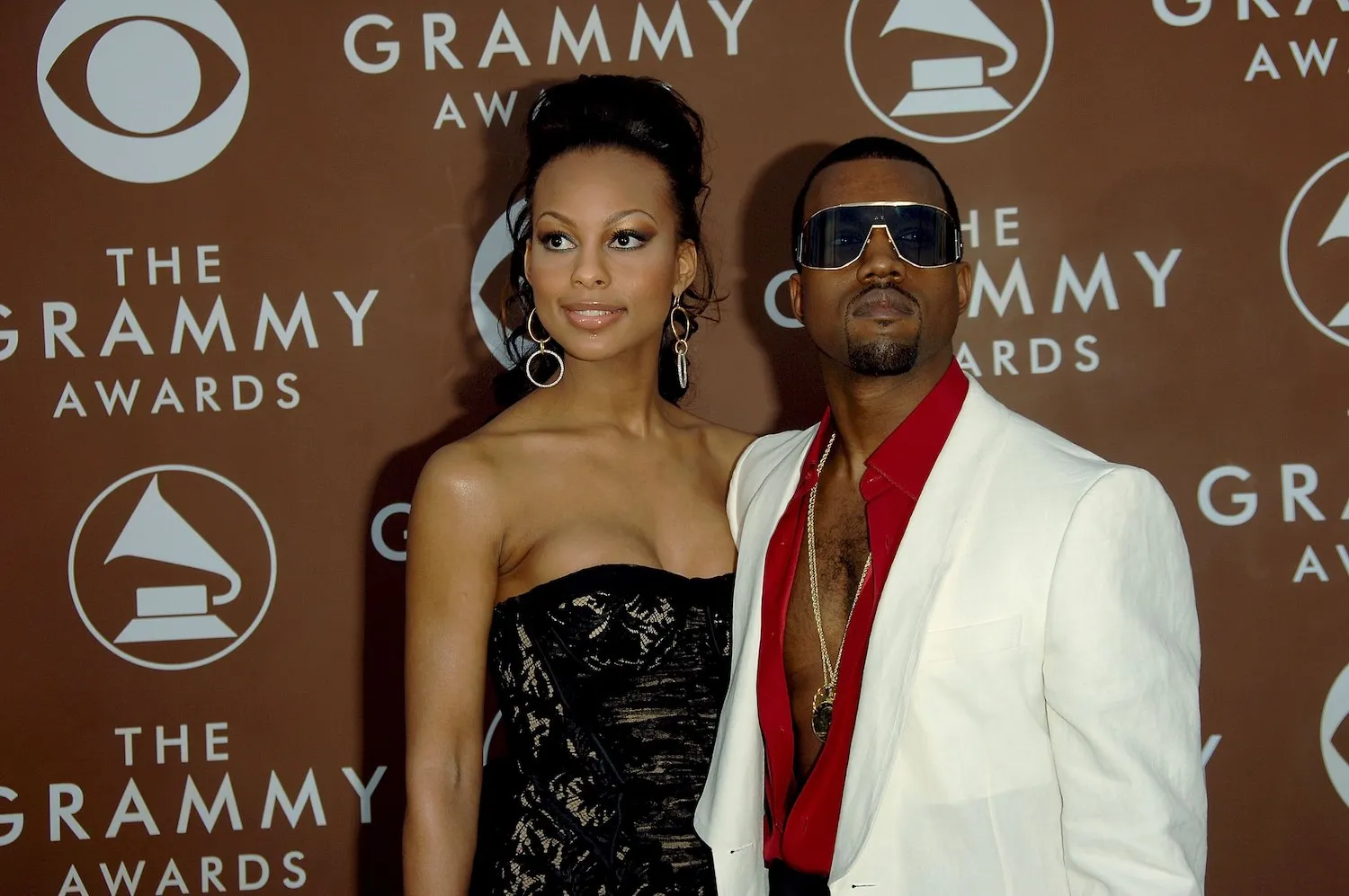 Kanye West and Brooke Crittendon standing together at the Grammys in 2006