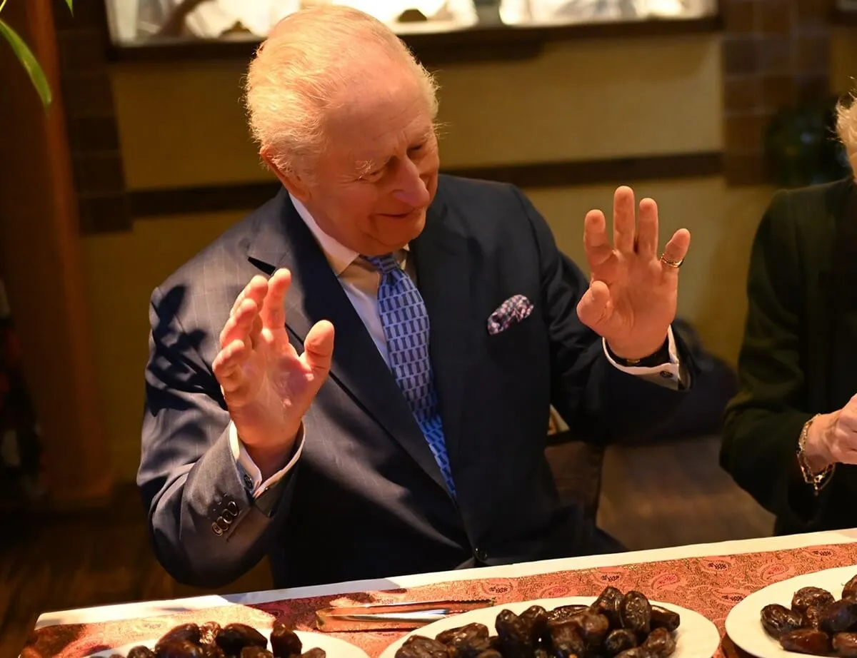 King Charles III meets British Muslim women at a female led restaurant and help pack donation boxes ahead of Ramadan in London