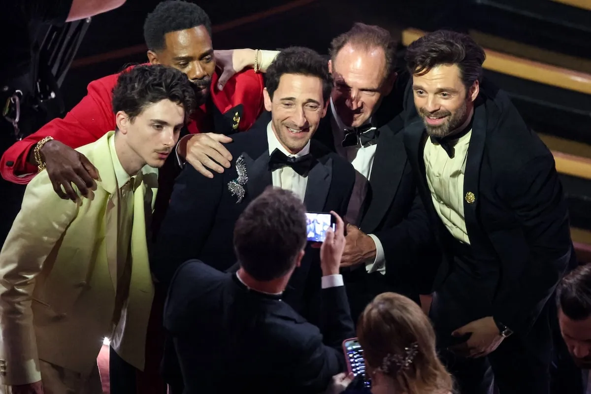 Best Actor nominees Timothée Chalamet, Colman Domingo, Adrien Brody, Ralph Fiennes, and Sebastian Stan take a photo together after Brody's win