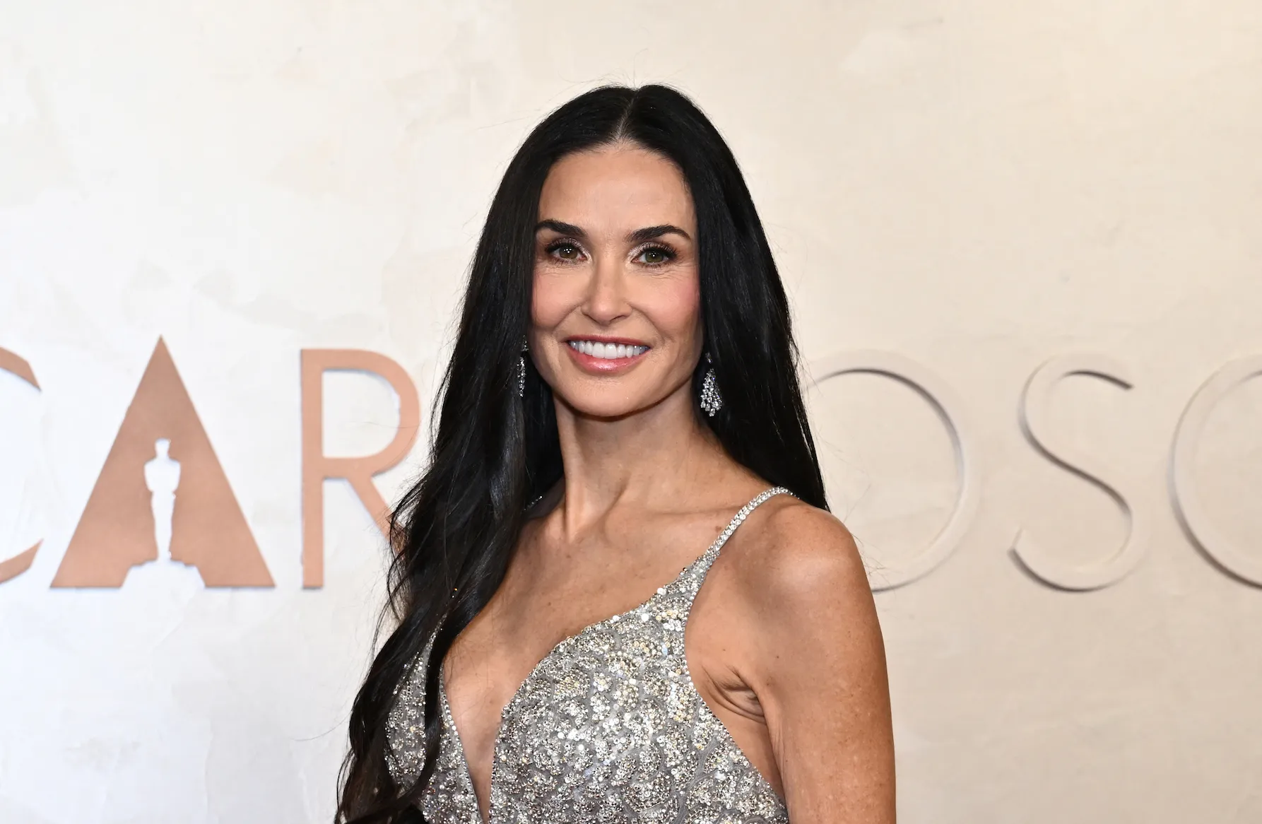 Demi Moore in a sparkling silver dress at the 97th Annual Academy Awards