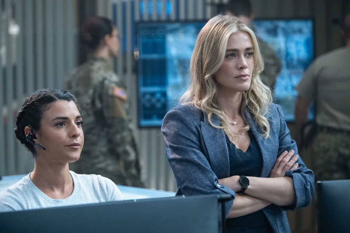 Bex (Melissa Roxburgh) standing with her arms crossed