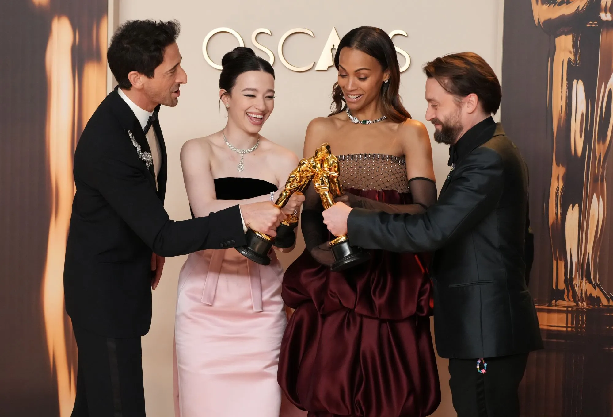 Oscar winners Adrien Brody, Mikey Madison, Zoe Saldana, and Kieran Culkin.