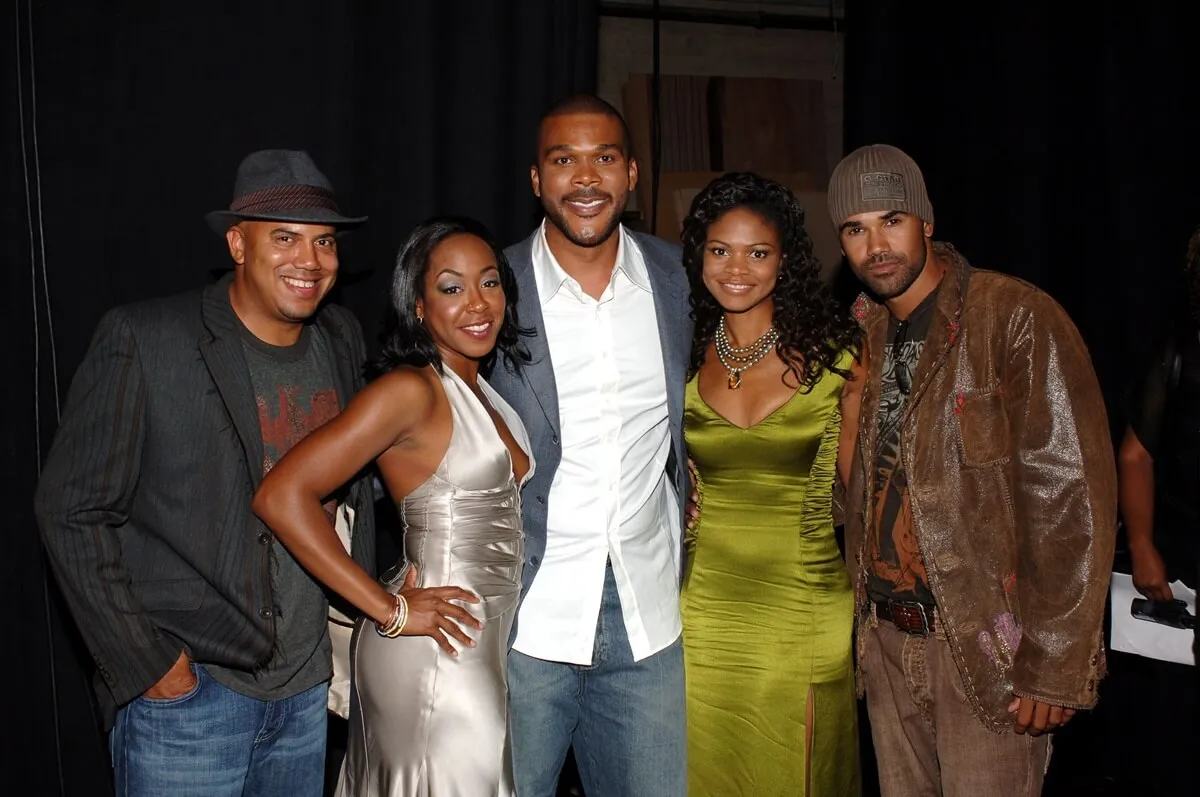 Tyler Perry posing alongside Kimberly Elise, Shemar Moore, Tichina Arnold, and Darren Grant backstage at the BET awards.