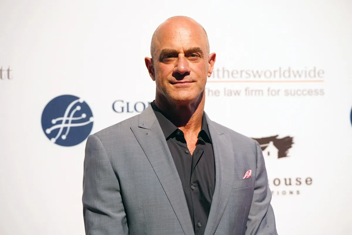Chris Meloni posing in a grey suit at the Global Lyme Alliance (GLA) Global Gala 2022