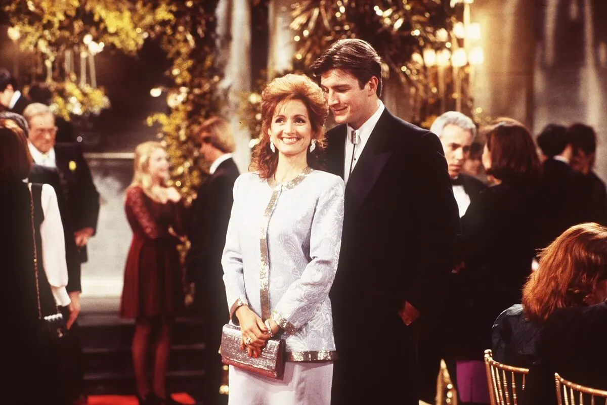 Nathan Fillion posing alongside Robyn Strasser in an episode of 'One Life to Live'.